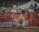 Photo of an excited fan cheering in the stands at Bullriding Nationals.