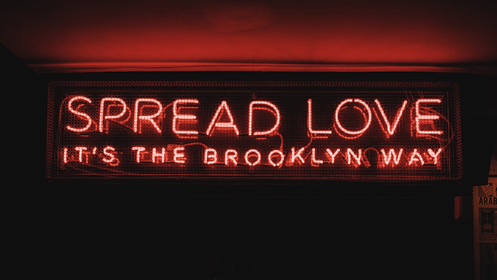 a sign that says spread love it's the brooklyn way