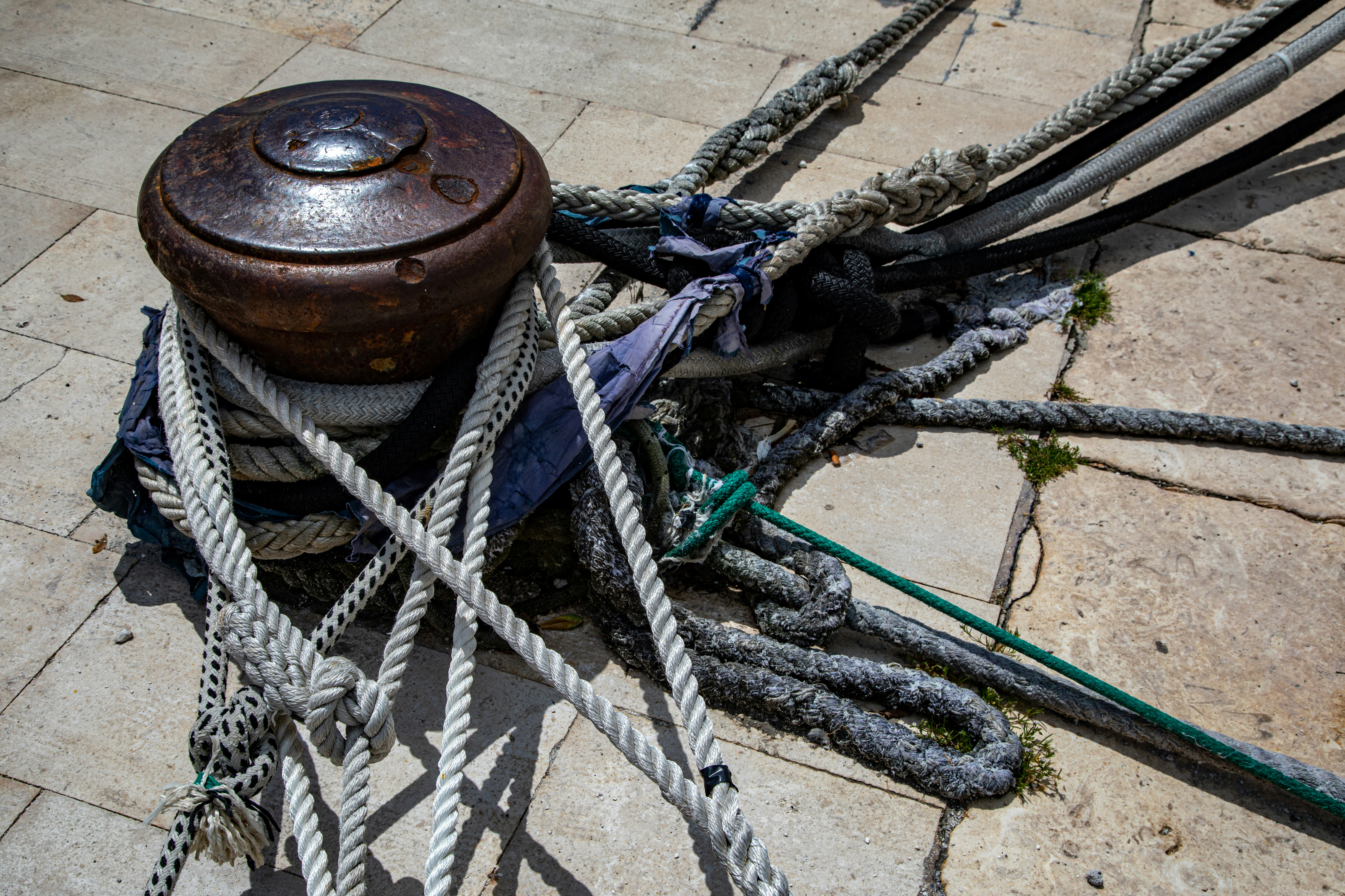 A close up of a fire hydrant surrounded by ropes photo – Free Boat ...