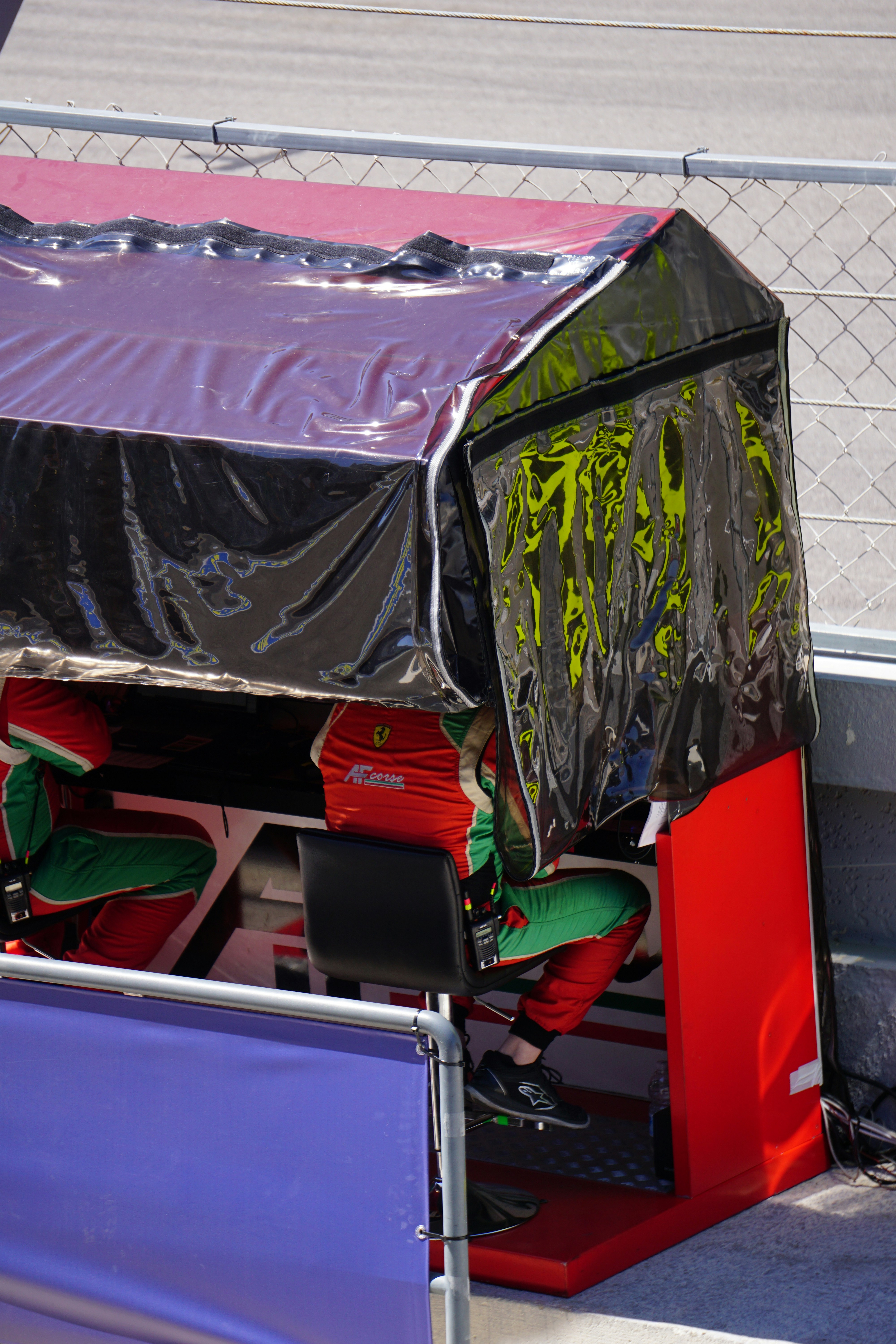 a car with a tarp on top of it