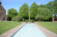 A peaceful garden area outside the church where members often reflect and pray.