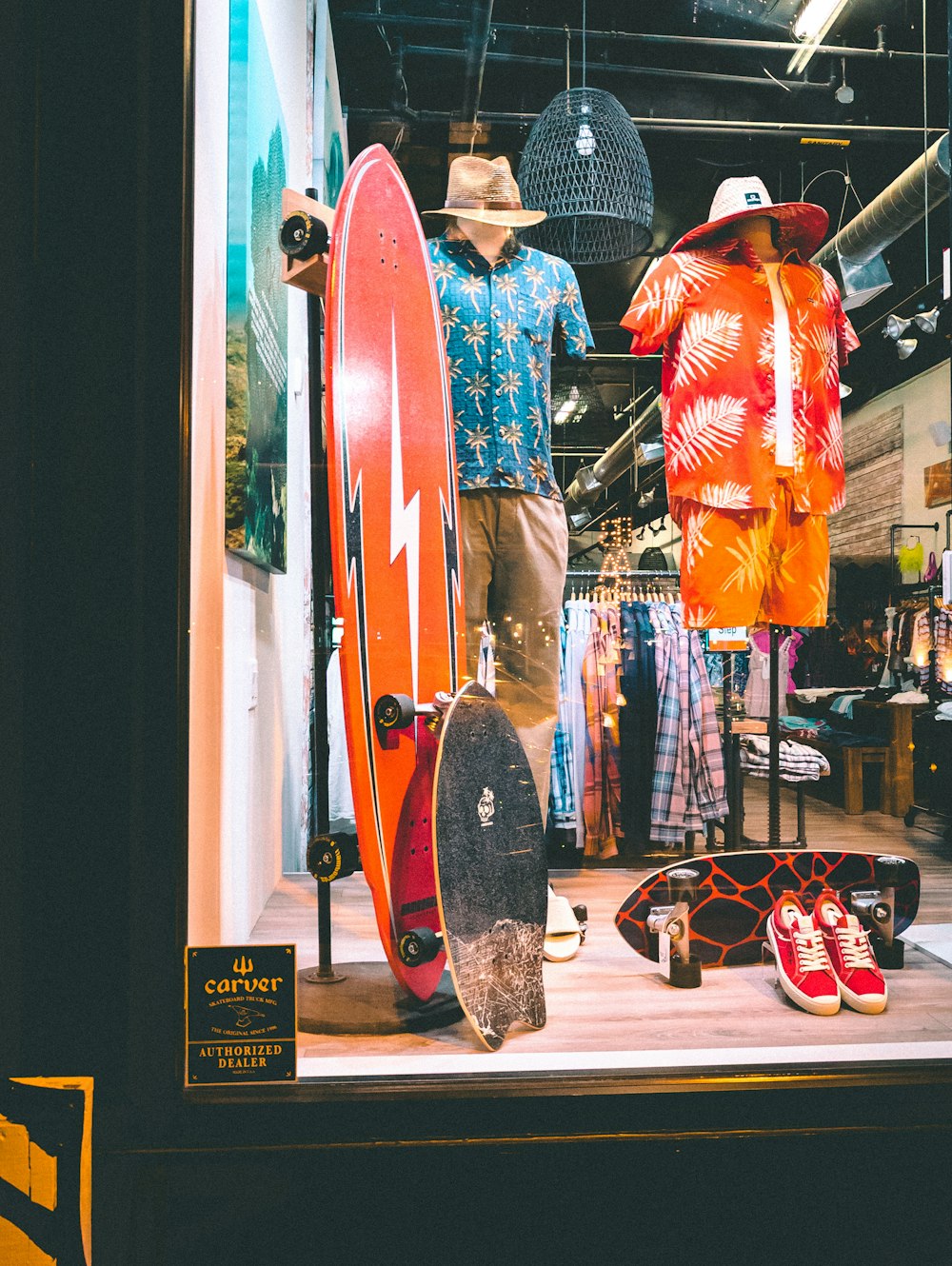 a display window with a surfboard and other items