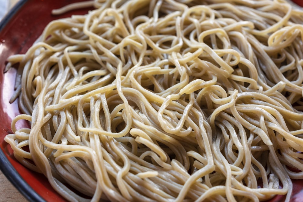 a plate full of noodles on a table