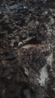 A detailed close-up of geological layers with technological instruments in the background.
