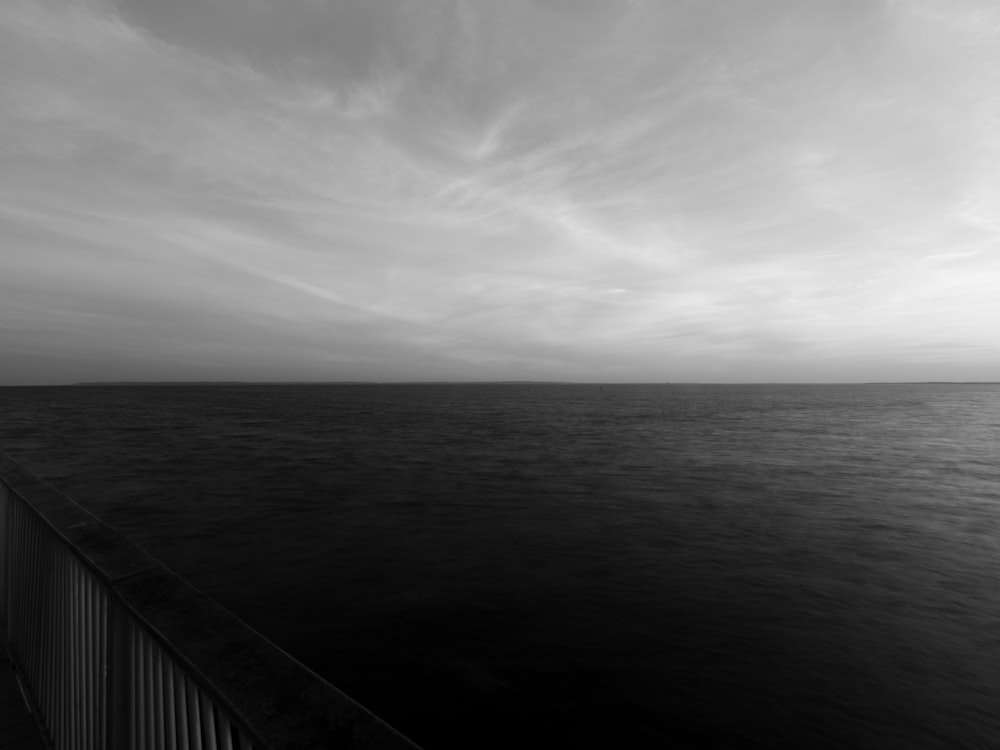 a black and white photo of a body of water