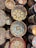 A beautifully arranged display of colorful ceramic bowls on a wooden table.