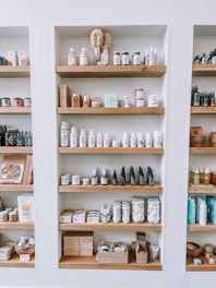 a shelf filled with lots of different types of items