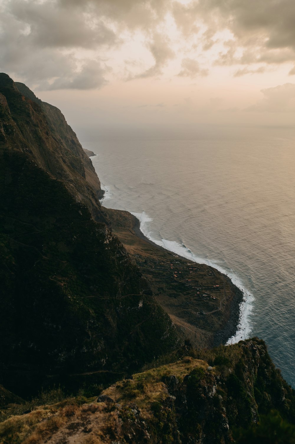 a view of the ocean from the top of a mountain