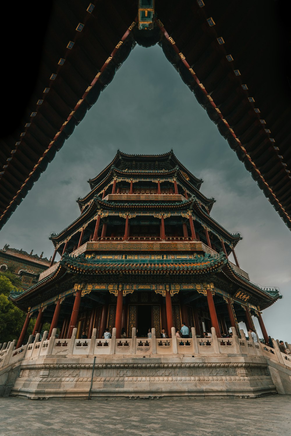 a tall building with a sky in the background