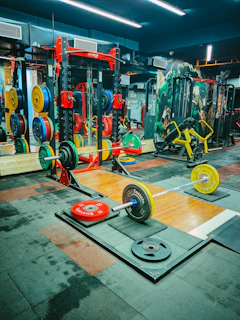 a gym filled with different types of exercise equipment