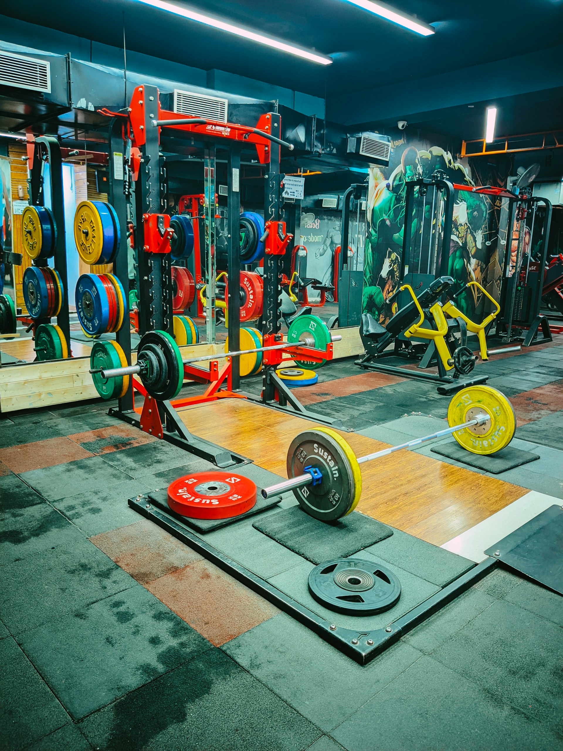 a gym filled with different types of exercise equipment