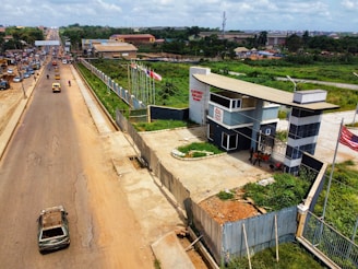 A Safeguard SA patrol vehicle driving through a secure residential estate with South African flags visible.