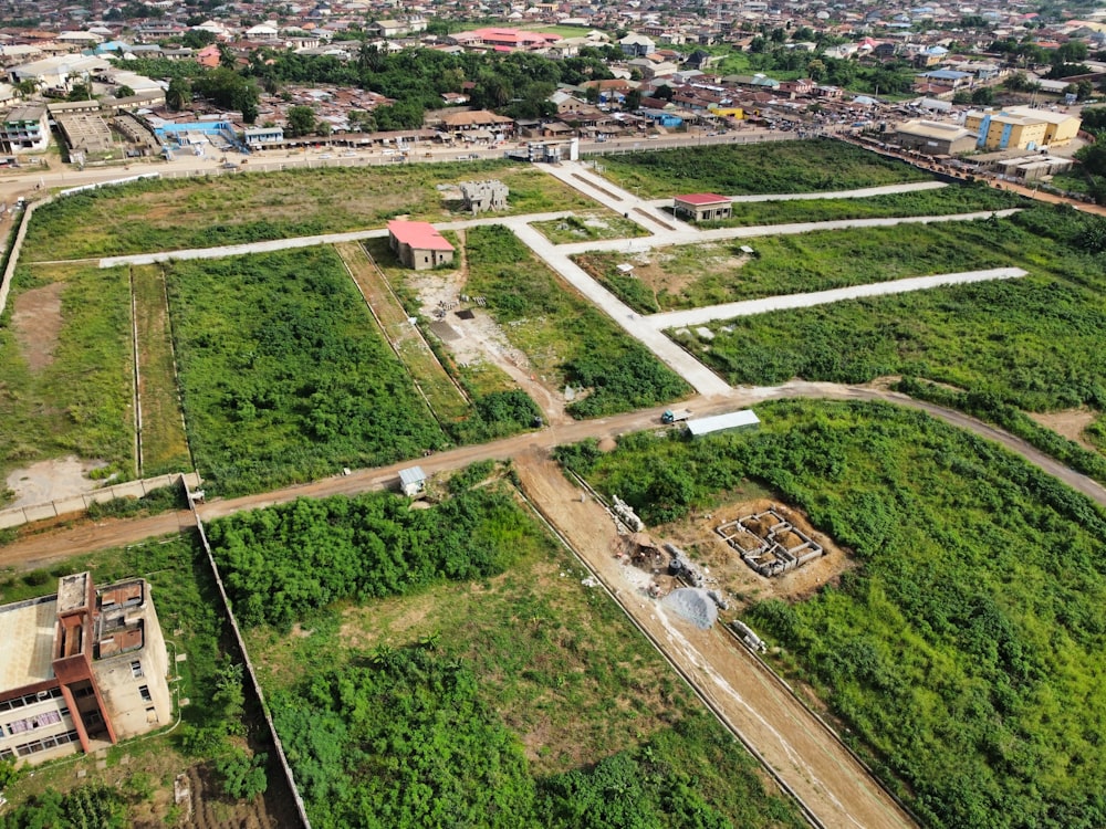 an aerial view of a city with lots of trees