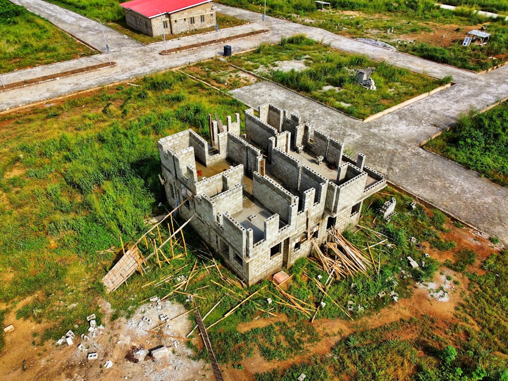 an aerial view of a building in the middle of nowhere