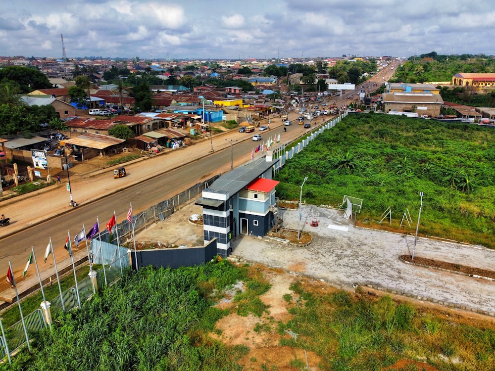 an aerial view of a small town with a bridge