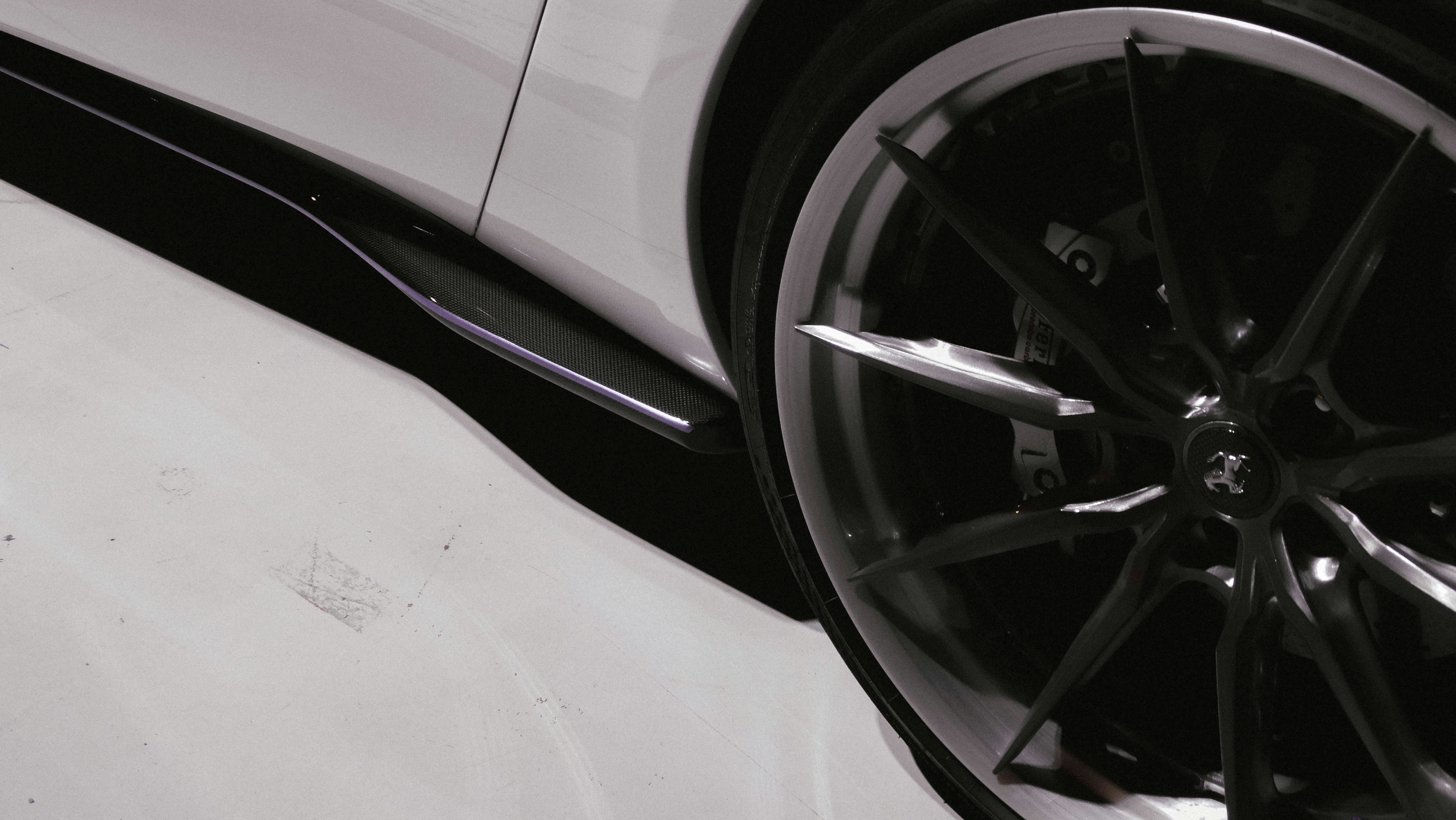 Tesla Model Y and Model 3 parked at a Supercharger station in the USA