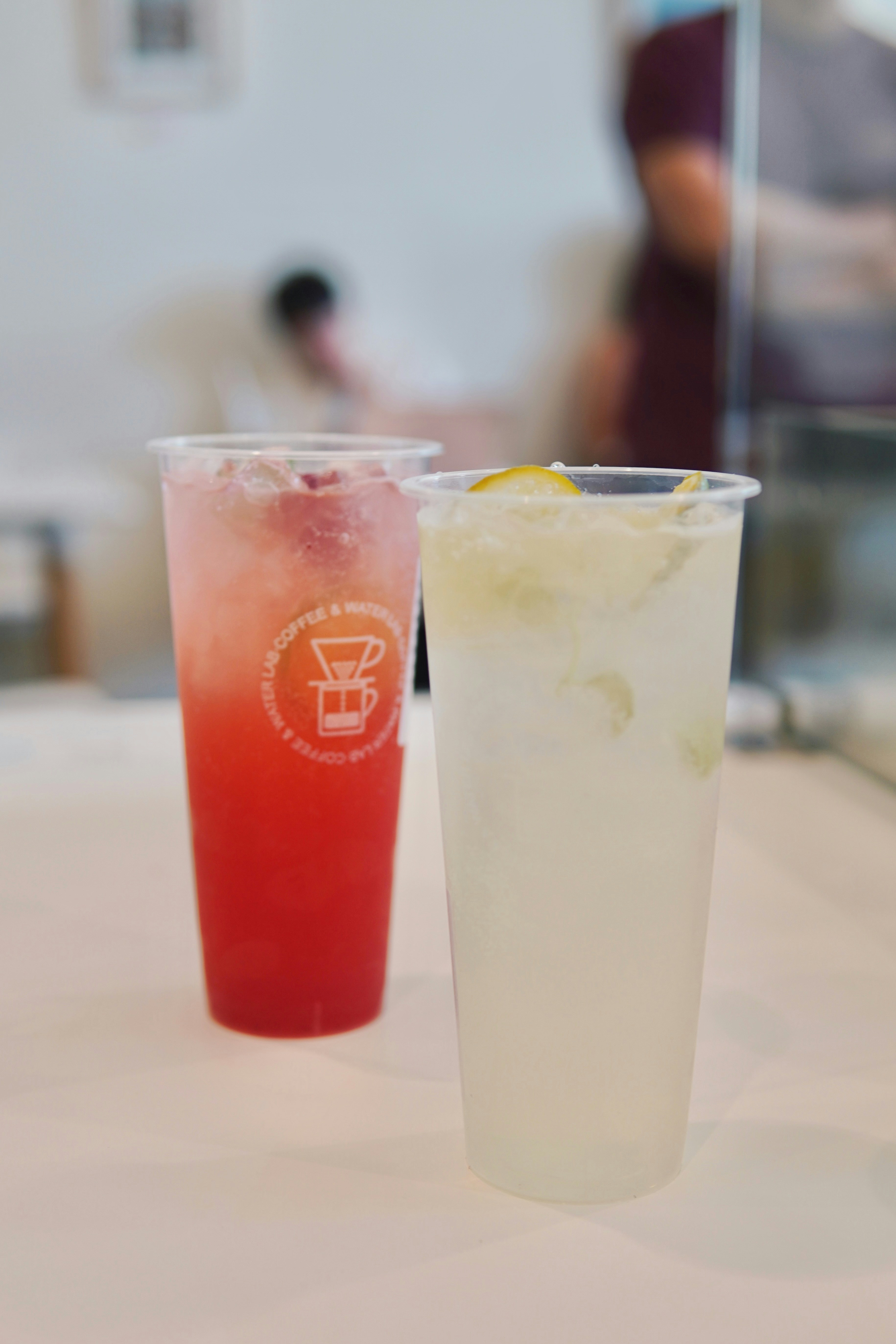 a couple of drinks sitting on top of a table