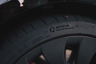 a close up of a tire on a car