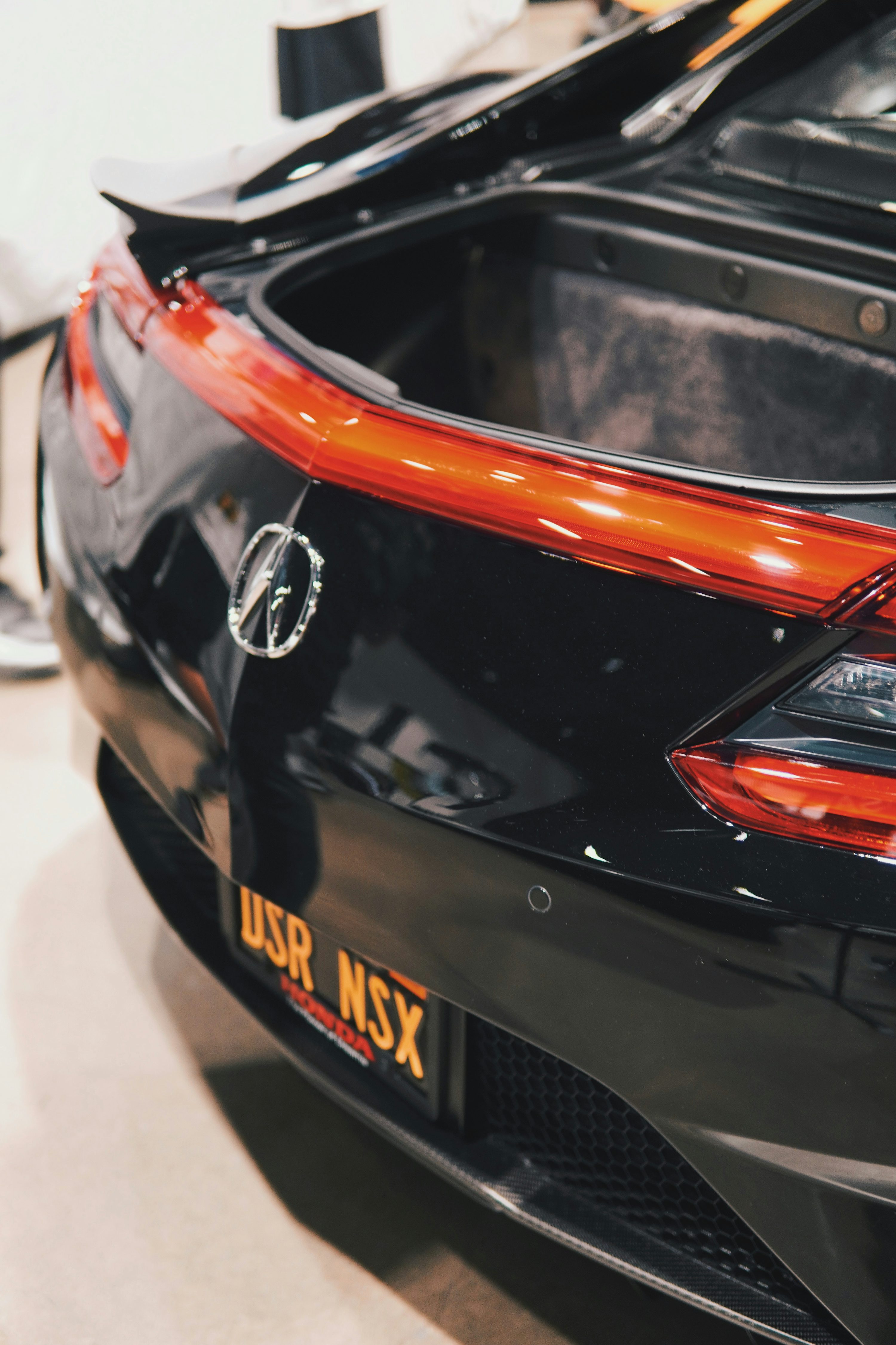 a close up of the tail end of a sports car