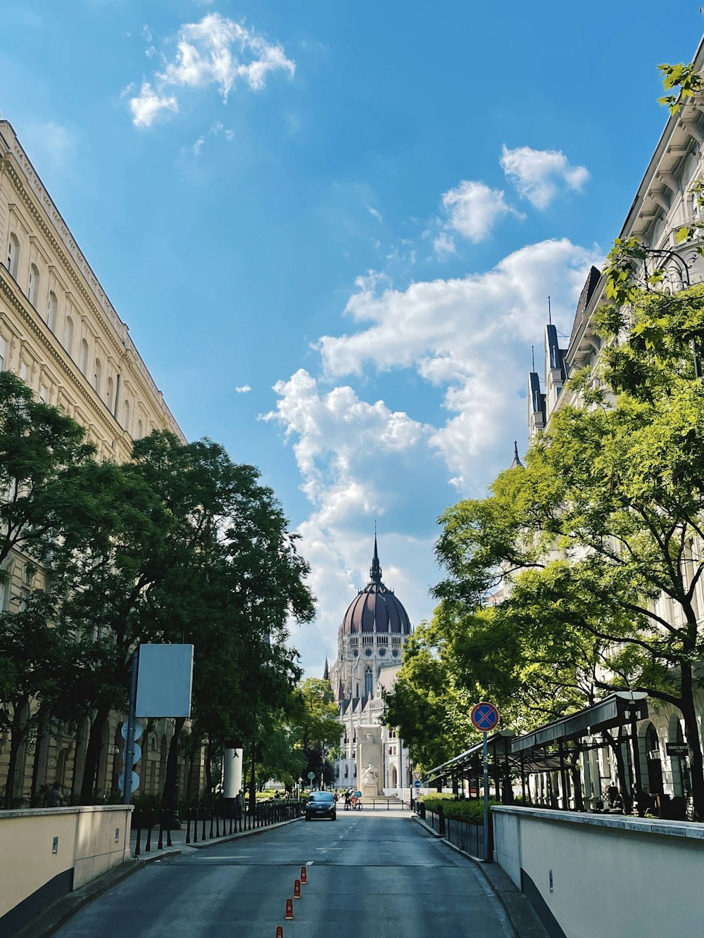 a city street with a building in the background