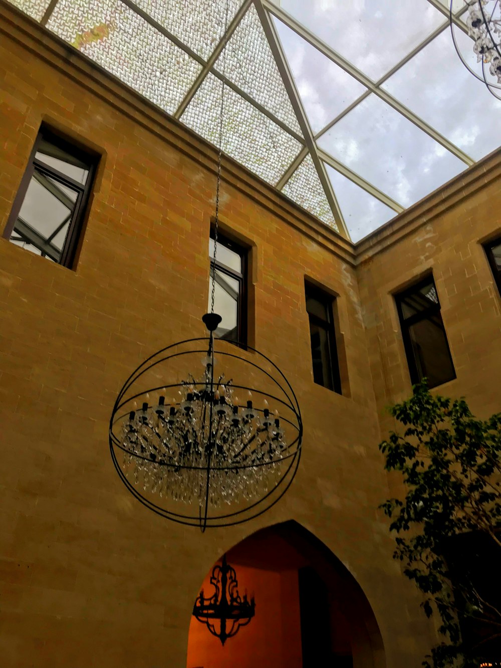 a chandelier hanging from the ceiling of a building