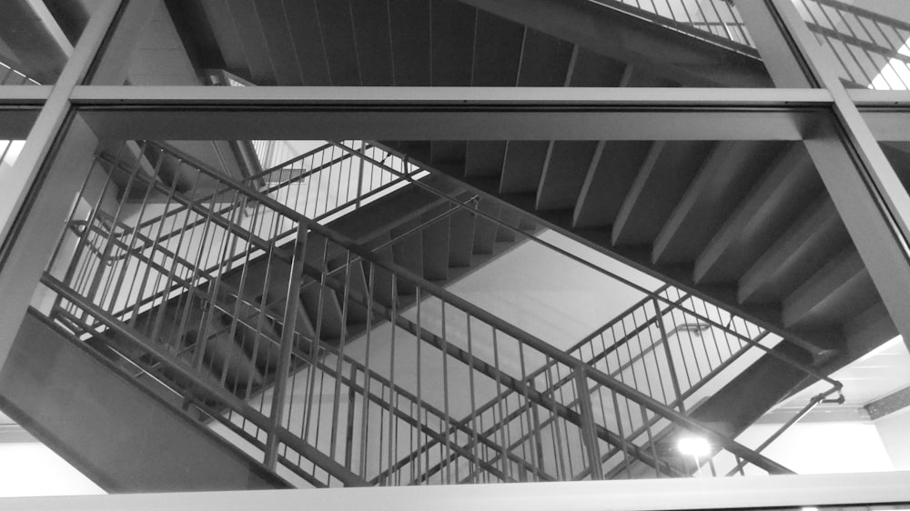 a black and white photo of a staircase