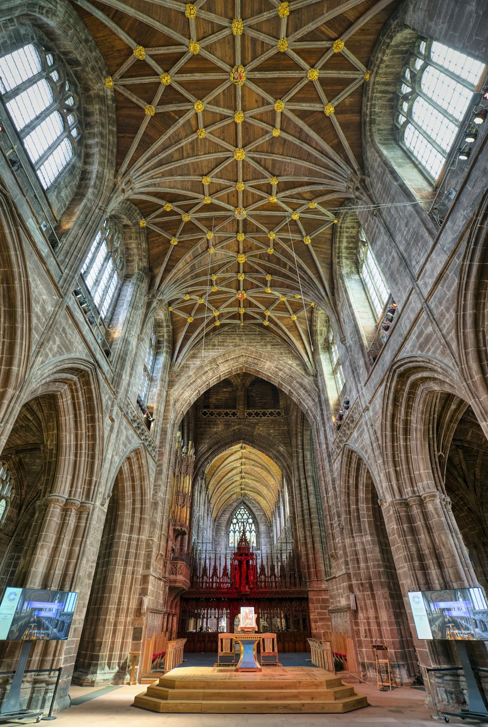 a large cathedral with high vaulted ceilings and stained glass windows