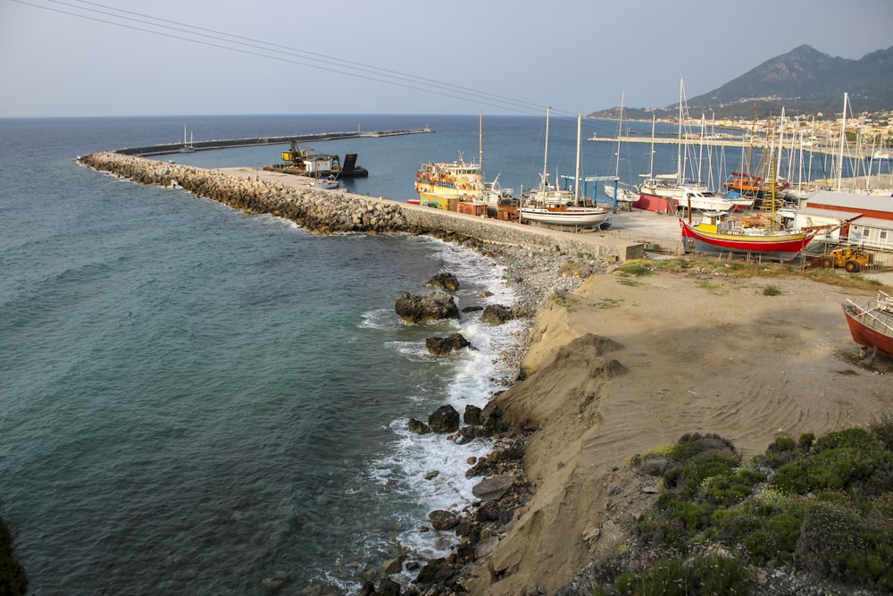 a group of boats that are sitting in the water