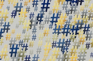 Bright neon hashtags and captions floating dynamically around a video clip preview.