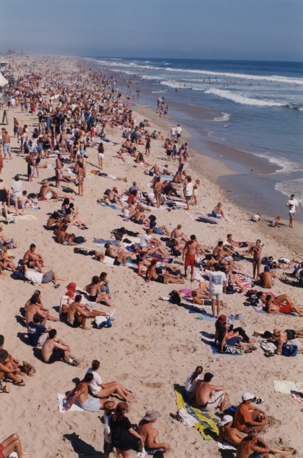 a large group of people on a beach