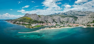 an aerial view of a small island in the middle of the ocean