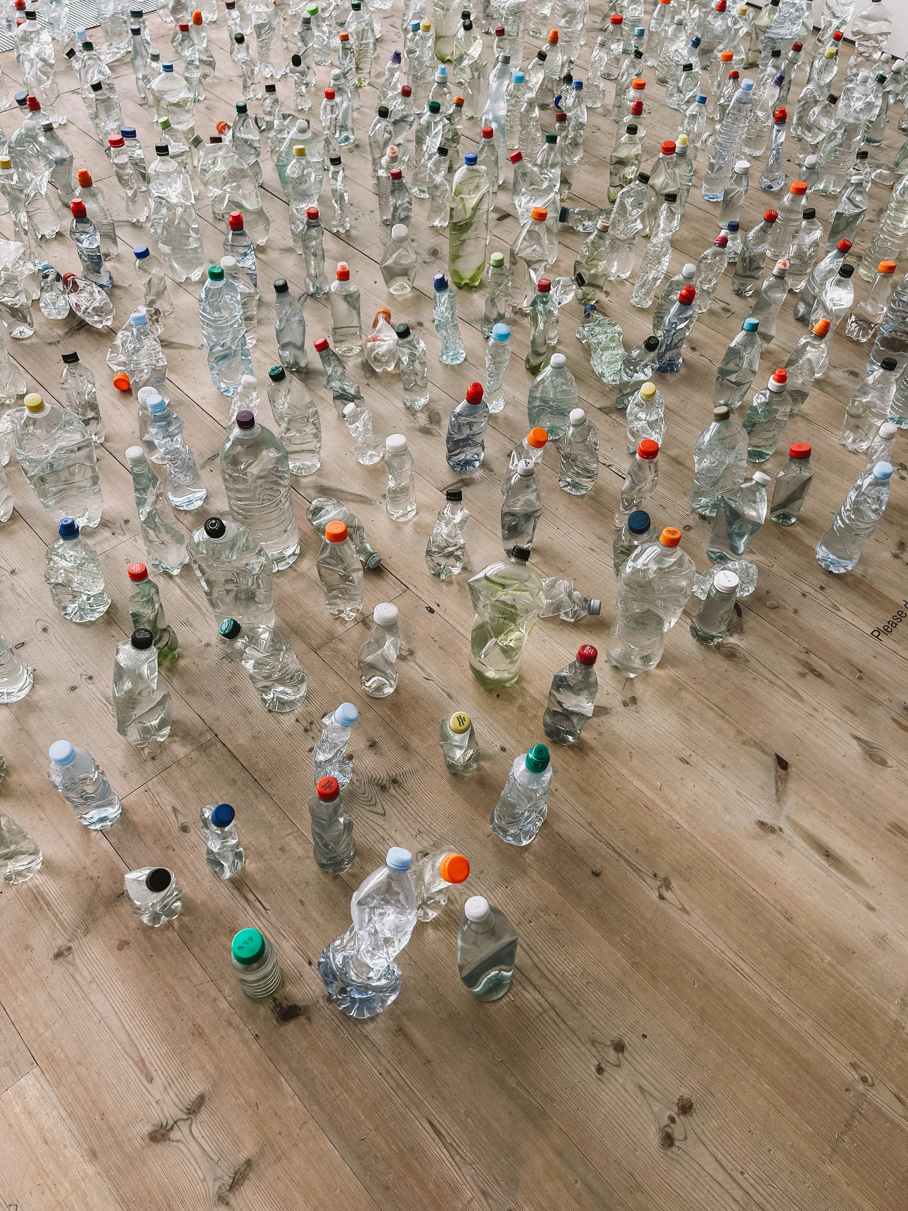 a room filled with lots of empty plastic bottles