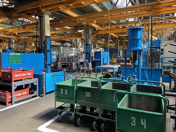 Industrial machinery and coding equipment in operation at a production facility.