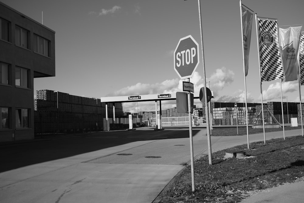 a black and white photo of a stop sign