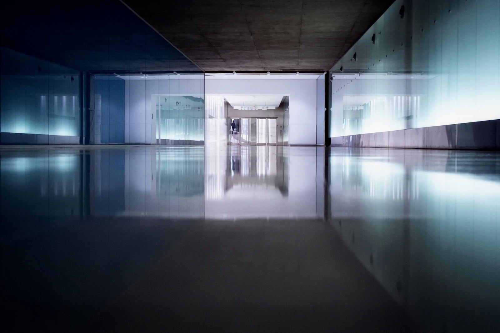 An empty room with a large mirror, a real stock photo chosen because Phony is about a teenager who believes his mother has been replaced by a look-alike. It is not a still from the show and it does not show anyone from the cast