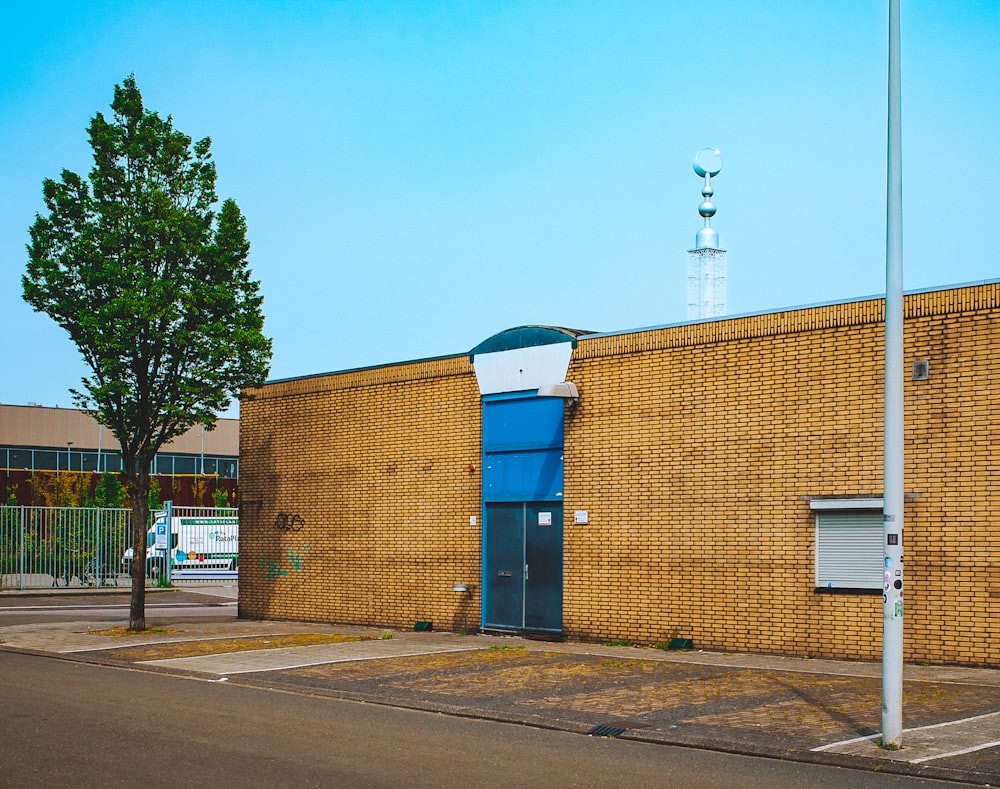 a brick building with a clock tower on top of it