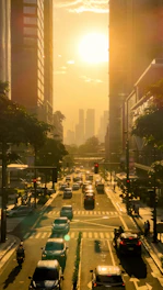 A candid photo of a city street at golden hour, showing bustling urban life in warm light.