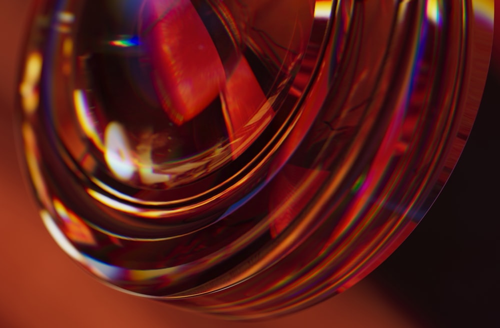 a close up of a glass object with a blurry background