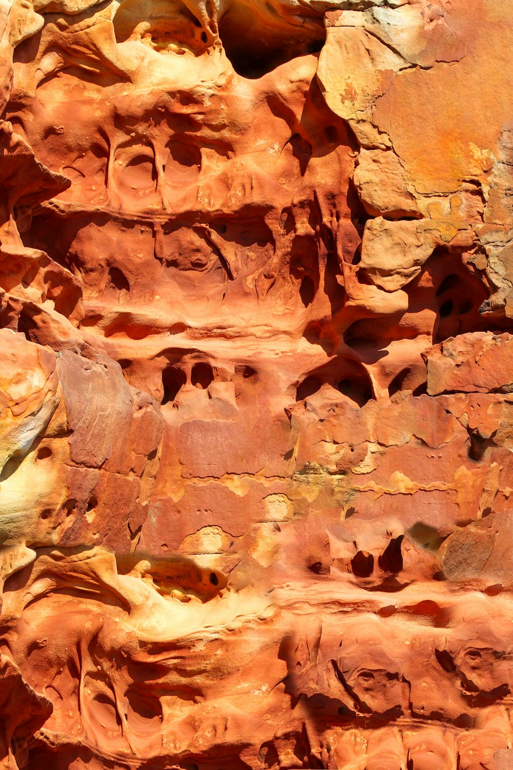 a rock formation with a bird perched on top of it