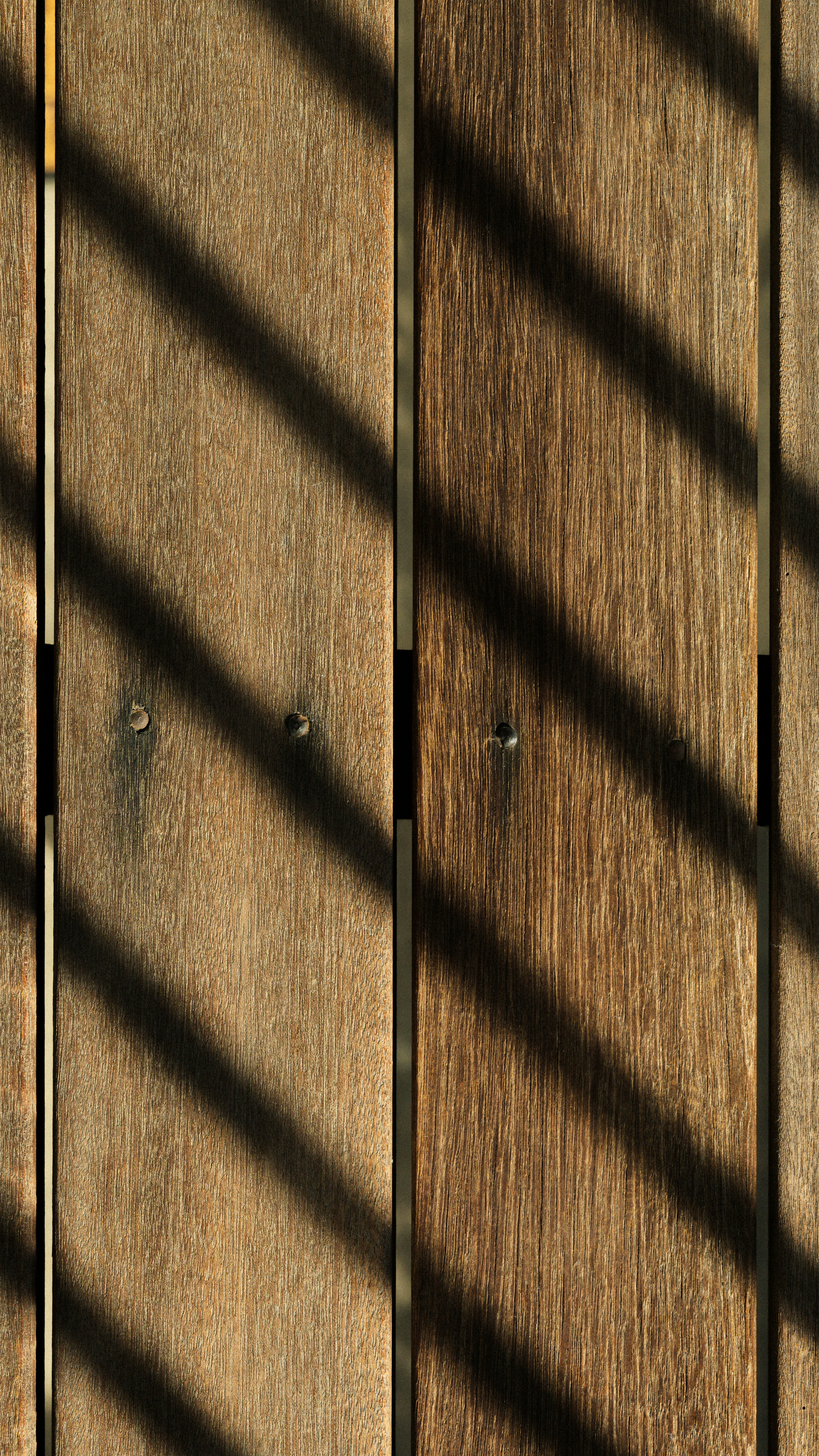 A close up of a wooden door with a metal handle photo Free Queensland