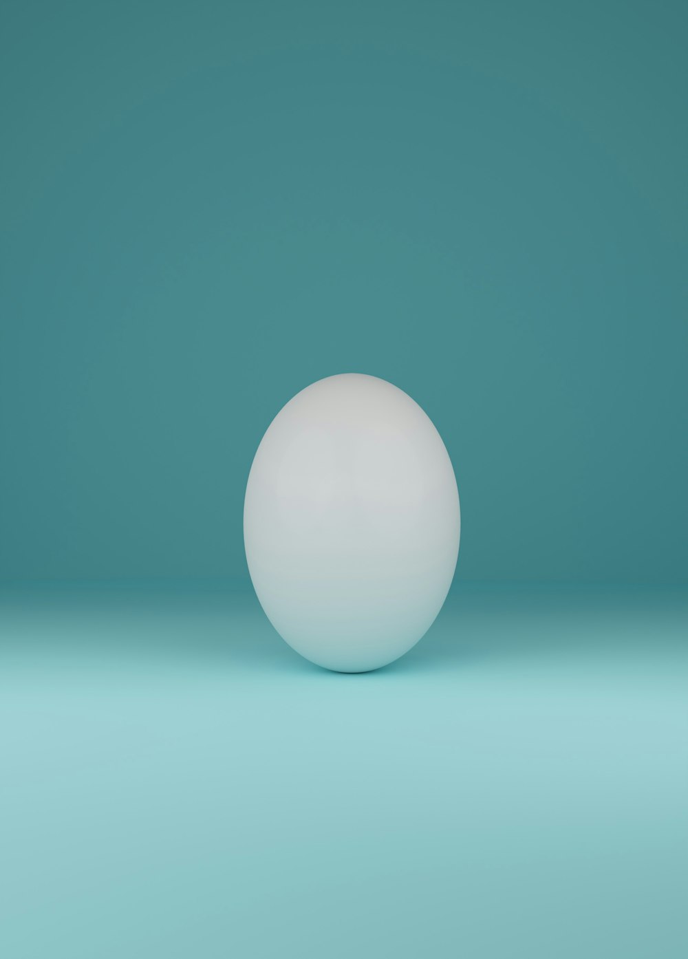 a white ball sitting on top of a blue surface