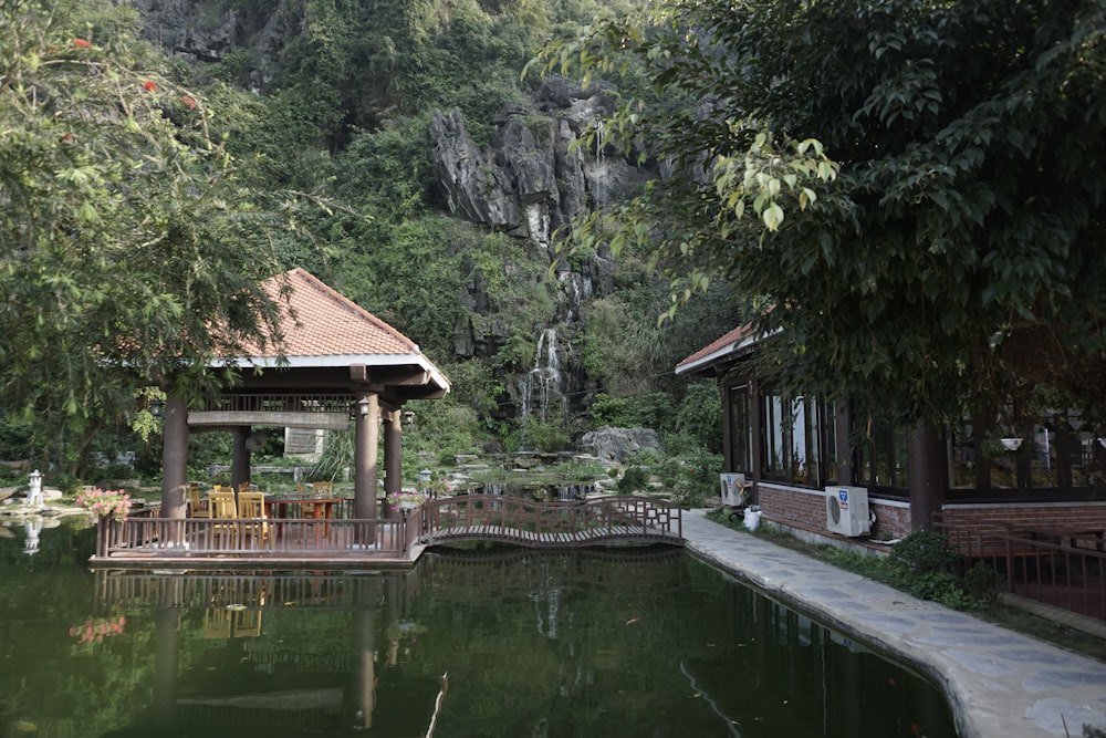 a gazebo sitting next to a body of water