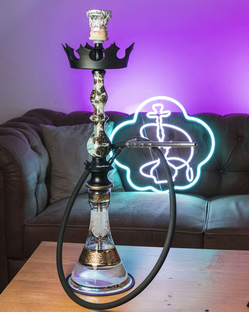 a hookah lamp sitting on top of a wooden table