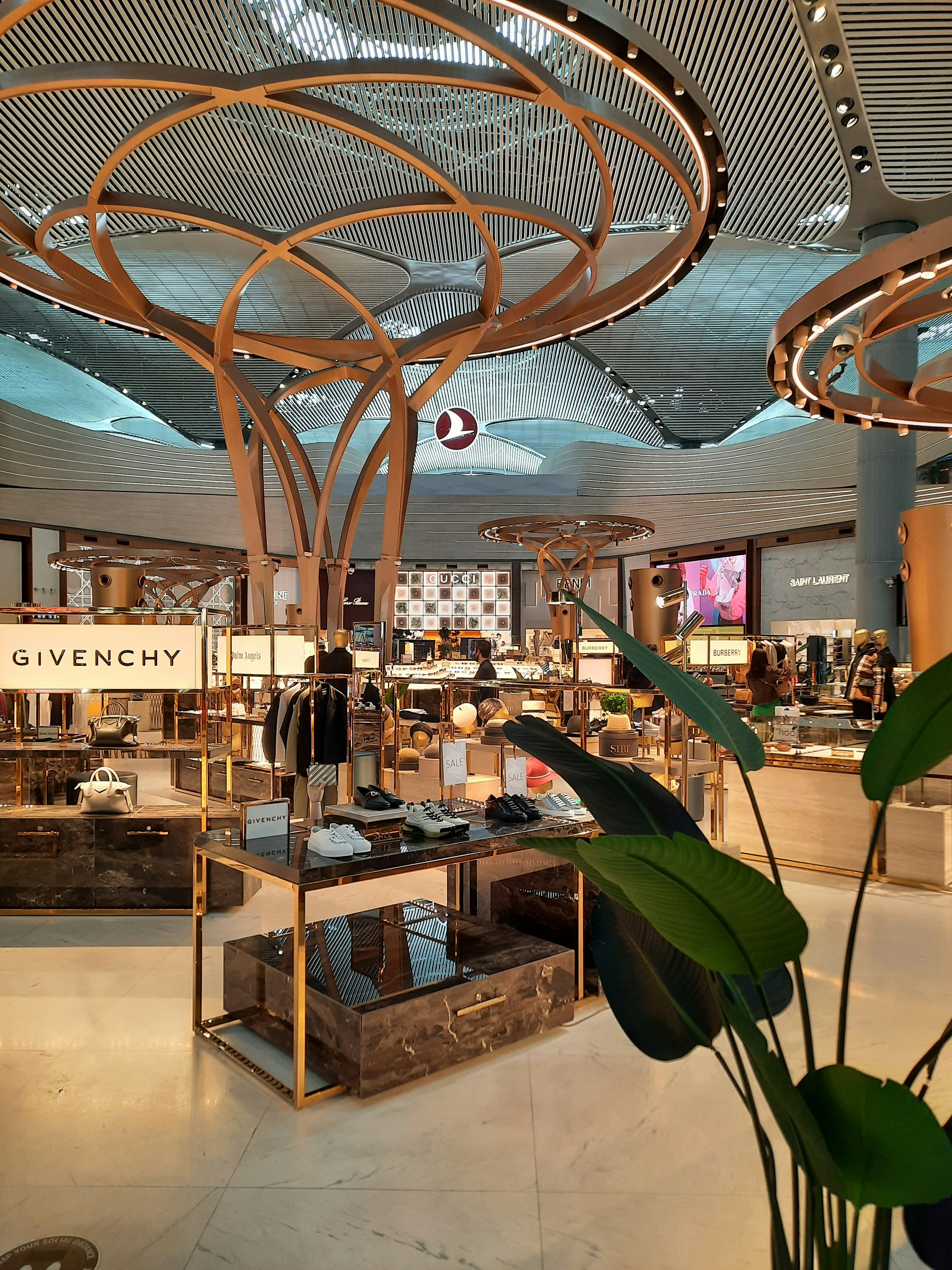 Upscale boutique clothing store with curated fashion displays and premium apparel