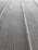 Close-up of freshly poured concrete surface with smooth finish.