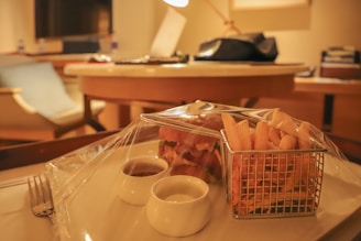 A nutritionist discussing healthy meal plans with a client in a cozy consultation room.