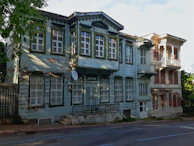 Before and after comparison of a neglected old house transformed into a warm living space.