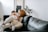 A warm and inviting scene of a mother reading a book with her child in a cozy living room.
