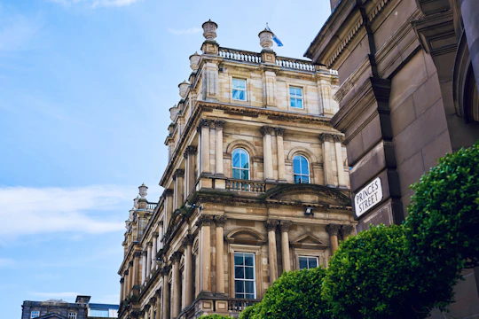 a tall building with a clock on the front of it