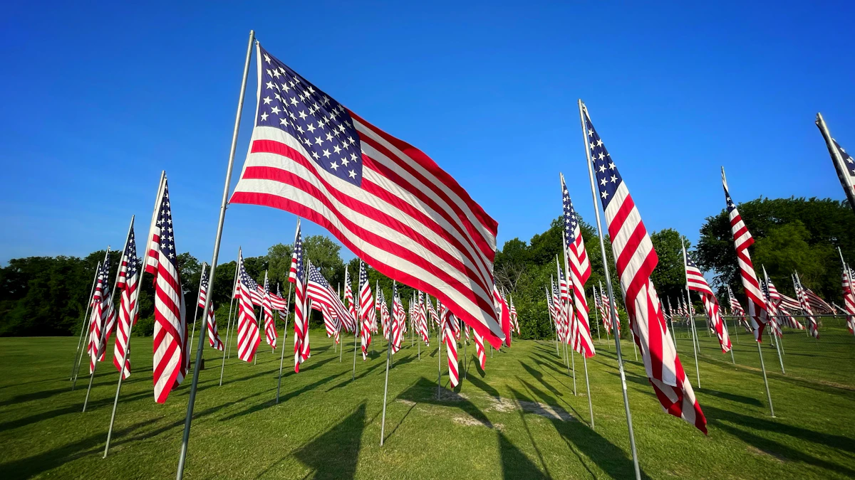 Large American flags displayed in a field for Memorial Day remembrance